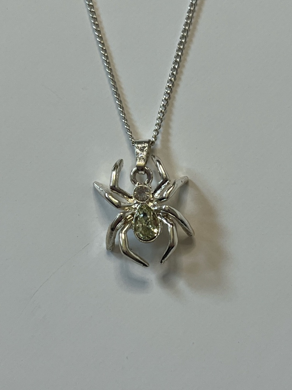 Silver Tone Spider Pendant Necklace with Pale Green Gem